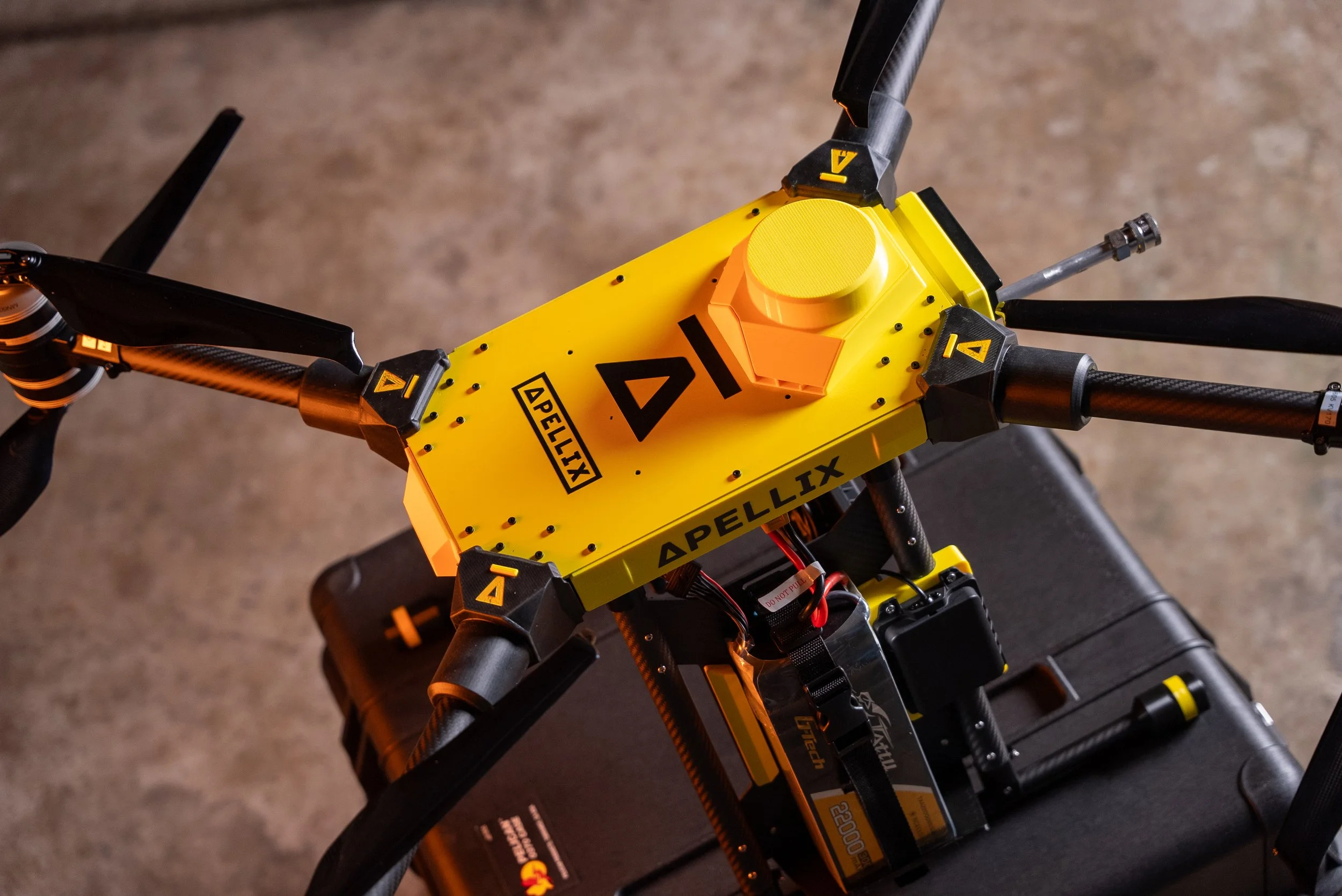 A yellow Apellix industrial inspection drone- Wash me drone (contact)